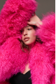 Women's natural llama fur coat in bright pink